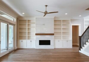 Licensed electrician completing a ceiling fan installation in Sydney home