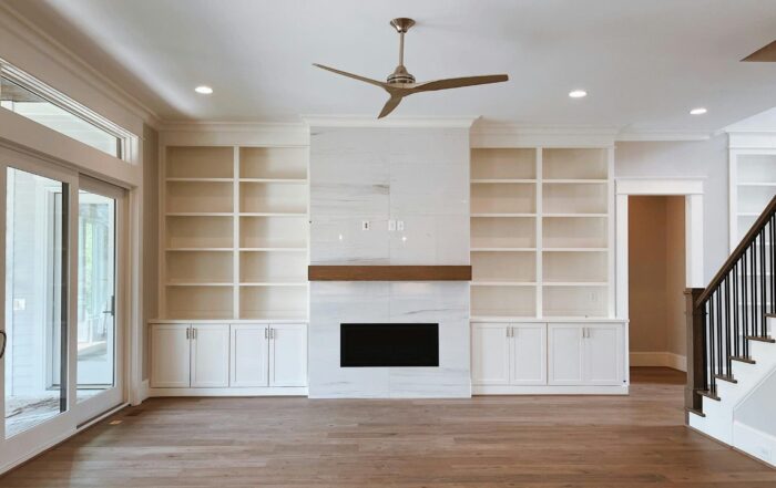Licensed electrician completing a ceiling fan installation in Sydney home