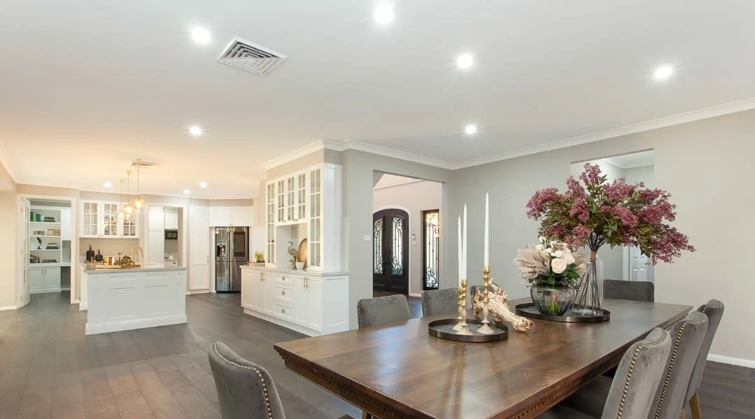 Modern dining and kitchen area with stylish lighting installed by Xceed Electrical